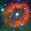 The white dot in the center of the red ring is a giant star.  The red ring is a sphere of stellar innards that star.