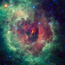 The multicolored cloud which spans the image is actually the Rosette Nebula located within the constellation Monoceros.