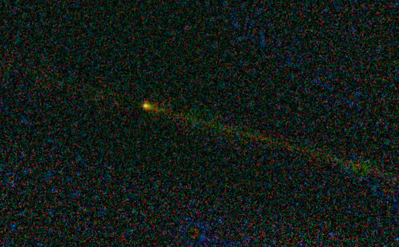 The yellowish colored trail of dust is the comet Hartley 2.