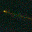 The yellowish colored trail of dust is the comet Hartley 2.
