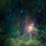 The bright fiery dot in the image is the star AE Aurigae which is surrounded by the Flaming Star Nebula.
