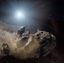This artist's concept shows a broken-up asteroid.
