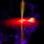 This artist's concept illustrates what the flaring black hole called GX 339-4 might look like. It shows a red disk in a field of stars, with yellow jets shooting out of the top and bottom.