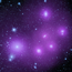 A star field with several purple glowing clumps.